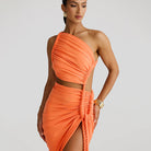 Orange one-shoulder ruched dress showcasing langry fashion for stylish ملابس choices