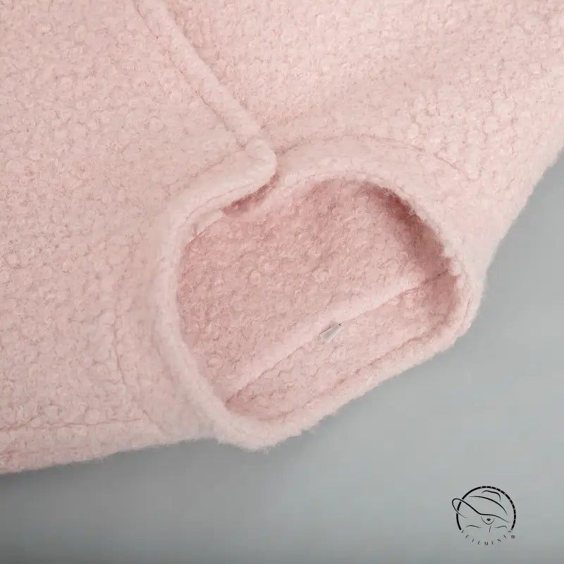 Pink short furry coat with fuzzy fabric sleeve