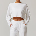 White cropped sweatshirt and sweatpants for long sleeve fashion sportswear collection
