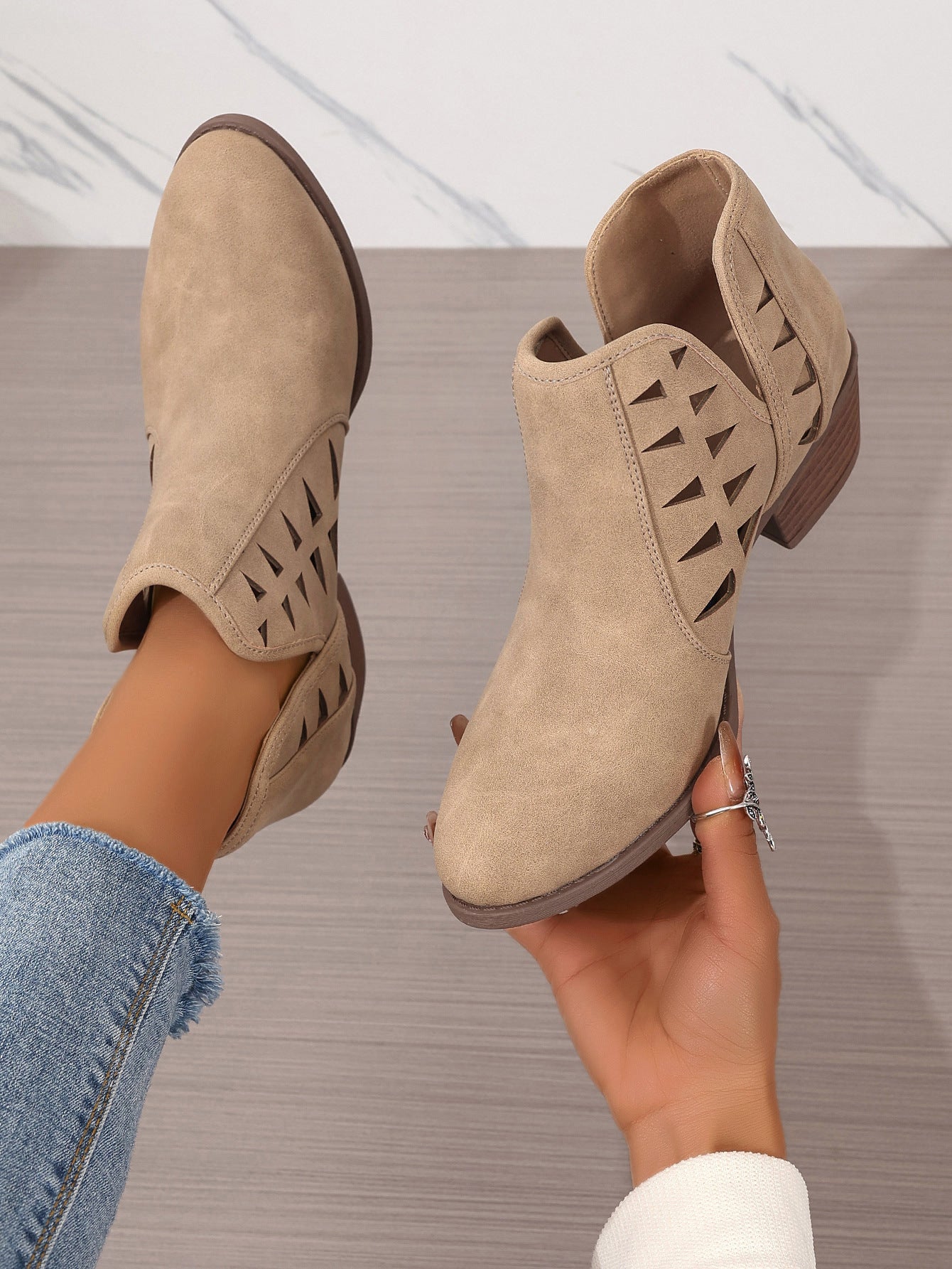 Beige suede Daily Ankle Boots featuring cutout side details and low stacked heels