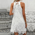 Sleeveless halter white doll dress with lace details