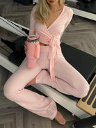 Pink insulated tumbler with silver lid in langry fashion yoga set