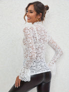 Slim fit Langry bell sleeve top with white lace blouse and gold hoop earrings
