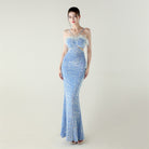 Langry blue sequined mermaid gown with ostrich feather embellishments