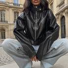 Fashionable Langry faux leather jacket with high collar and zipper details