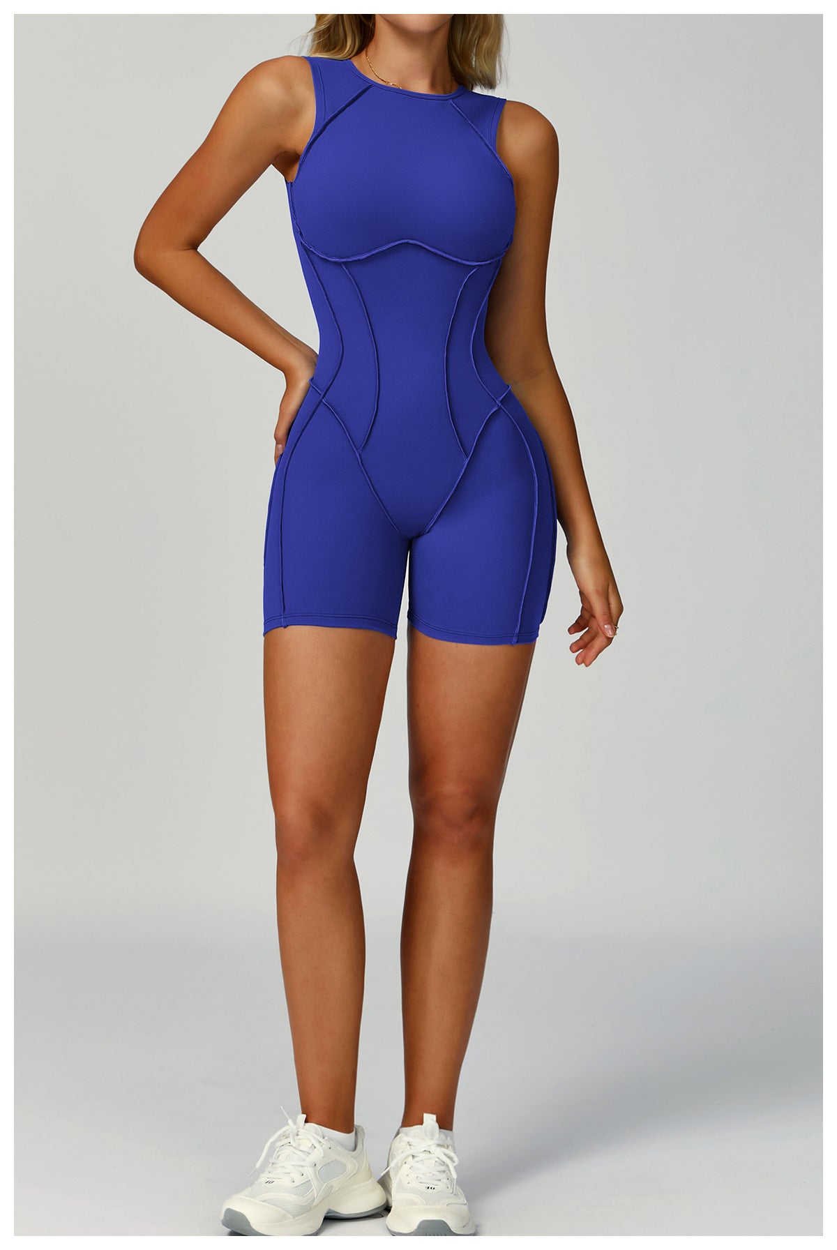 Royal blue langry fashion yoga jumpsuit in form-fitting bodysuit design with white sneakers