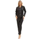 Black satin langry pajamas with shimmer, white piping, and bold stripes