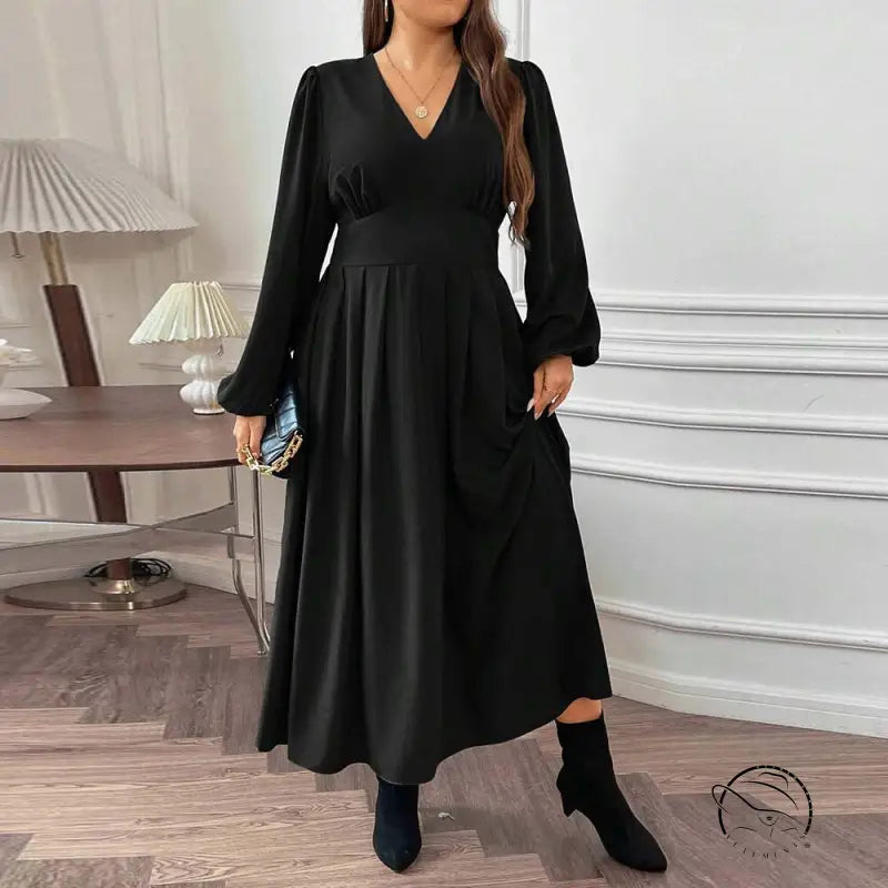 Gorgeous large swing dress: black long-sleeved maxi with V-neck and cinched waist