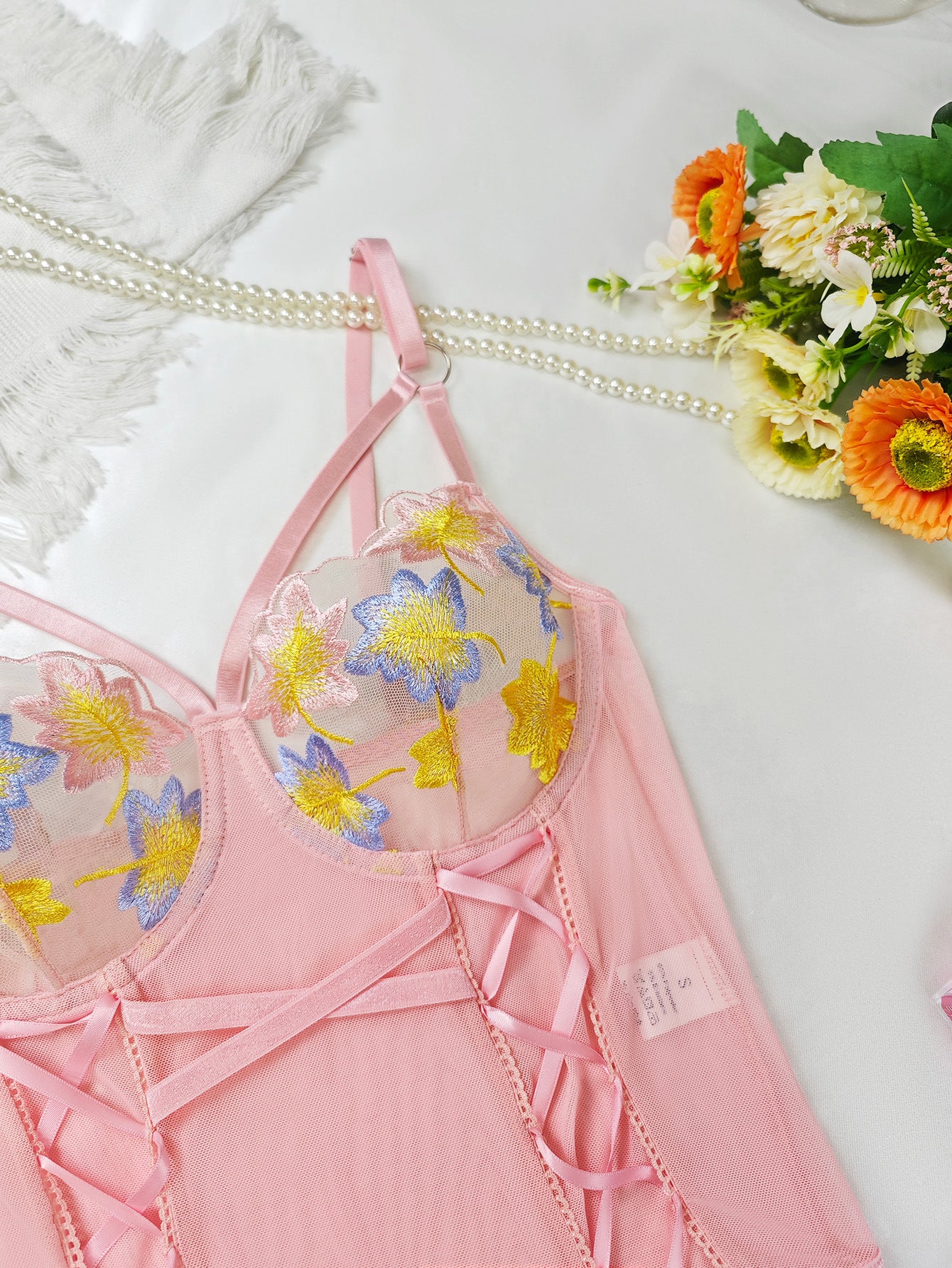 Pink floral lace lingerie set with sheer mesh crisscross straps