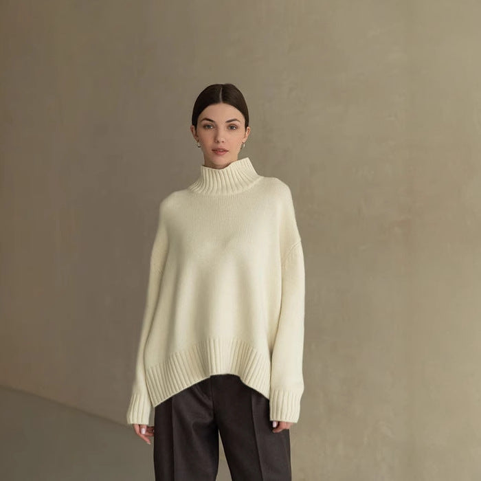 Cream oversized turtleneck Langry fashion sweater with black pants
