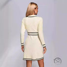 Cream-colored knitted classic dress with black trim