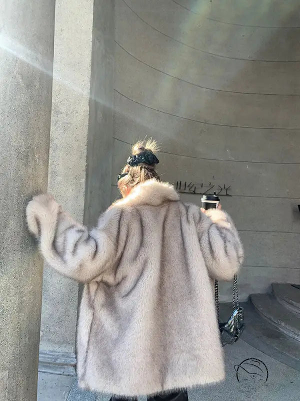 Light beige faux fur shearling winter jacket with fur trim