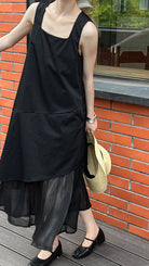 Elegant Korean style dress featuring a black layered sleeveless design with chiffon hem