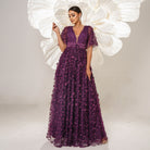 Elegant purple floral-embellished gown from Langry fashion collection for bridesmaid or evening wear