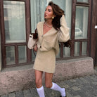 Beige boucle knit cardigan with pockets in Langry fashion outfit