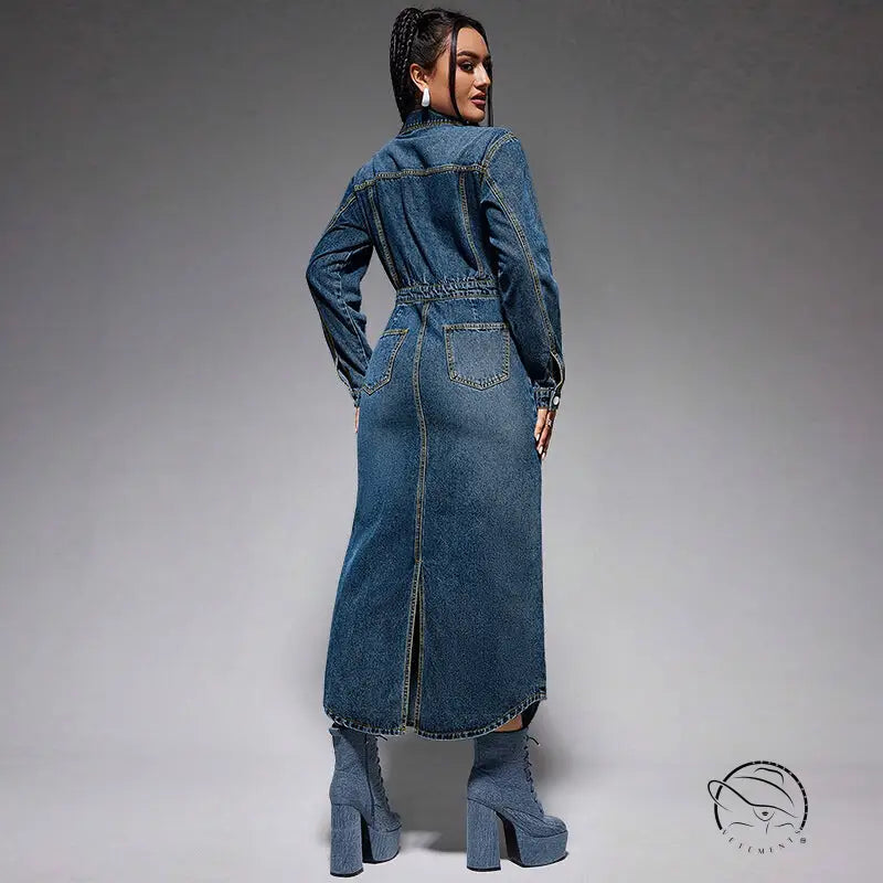 Woman modeling split denim maxi dress with cinched waist and boots