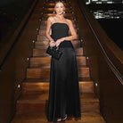 Woman in stunning slim fitting langry fashion patchwork dress