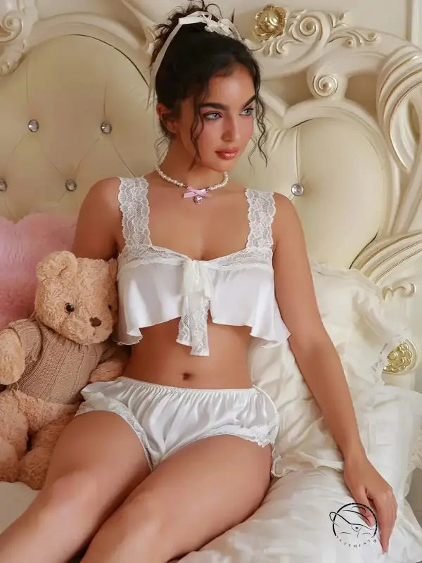 Seductive lingerie set with white lace-trimmed crop top and shorts