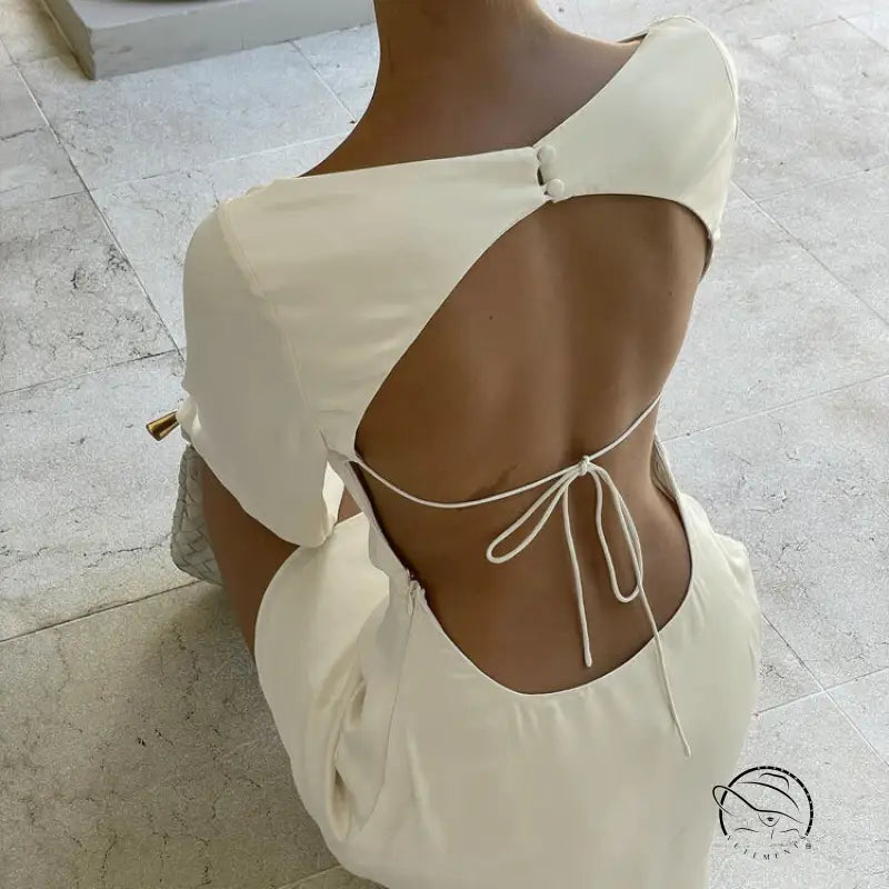 Enchanting short A-line dress in backless white with tie closure