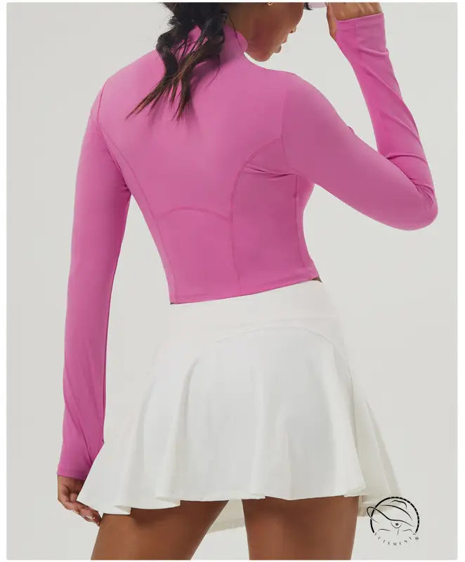 Long sleeve pink sports jacket with white pleated tennis skirt for women