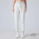 Light gray casual loose tapered sports pants with elastic cuffs