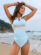 Light blue Langry one-piece swimsuit with stripes and ties