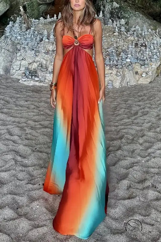Exquisite beach dress with flowing maxi ombré from orange to turquoise