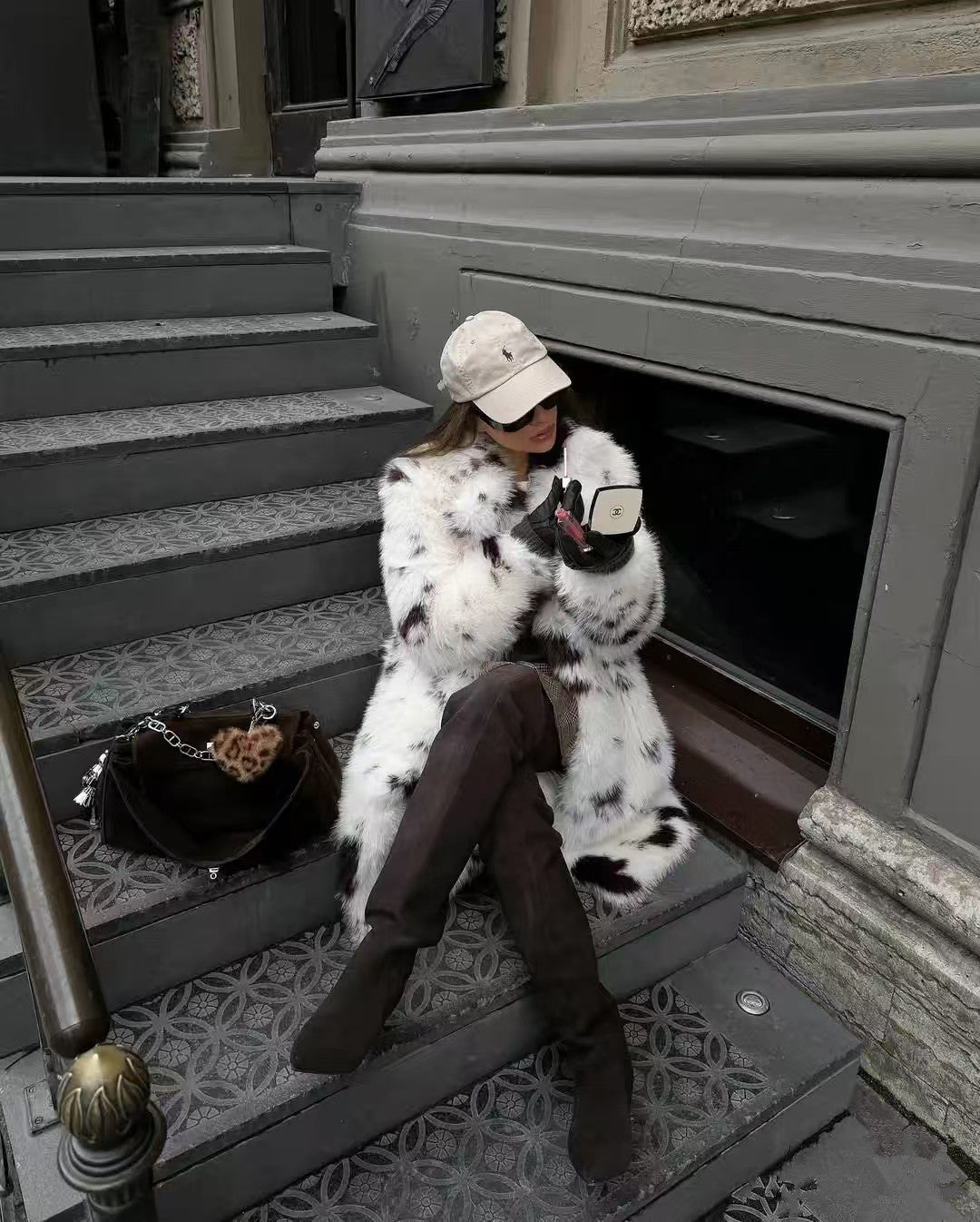 Cozy faux fur long coat with white black speckled hood by Mackage fashion