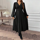 Gorgeous large swing dress: black V-neck midi with pleated skirt