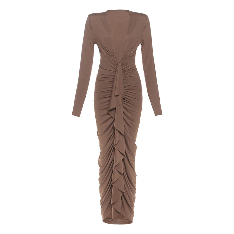 Elegant slim evening dress in brown ruched fashion with long sleeves and asymmetrical neckline