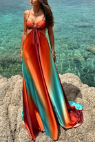 Exquisite Beach Dress featuring a flowing maxi design in orange and turquoise ombre
