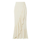 Cream-colored ruffled maxi skirt complementing an elegant retro swimsuit design