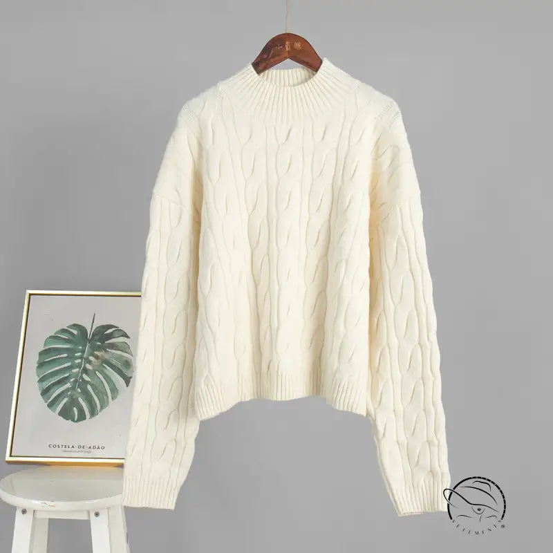Winter loose knit sweater in cream cable knit on wooden hanger, Langry fashion ملابس