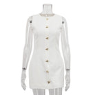 White short French dress with gold buttons and straps