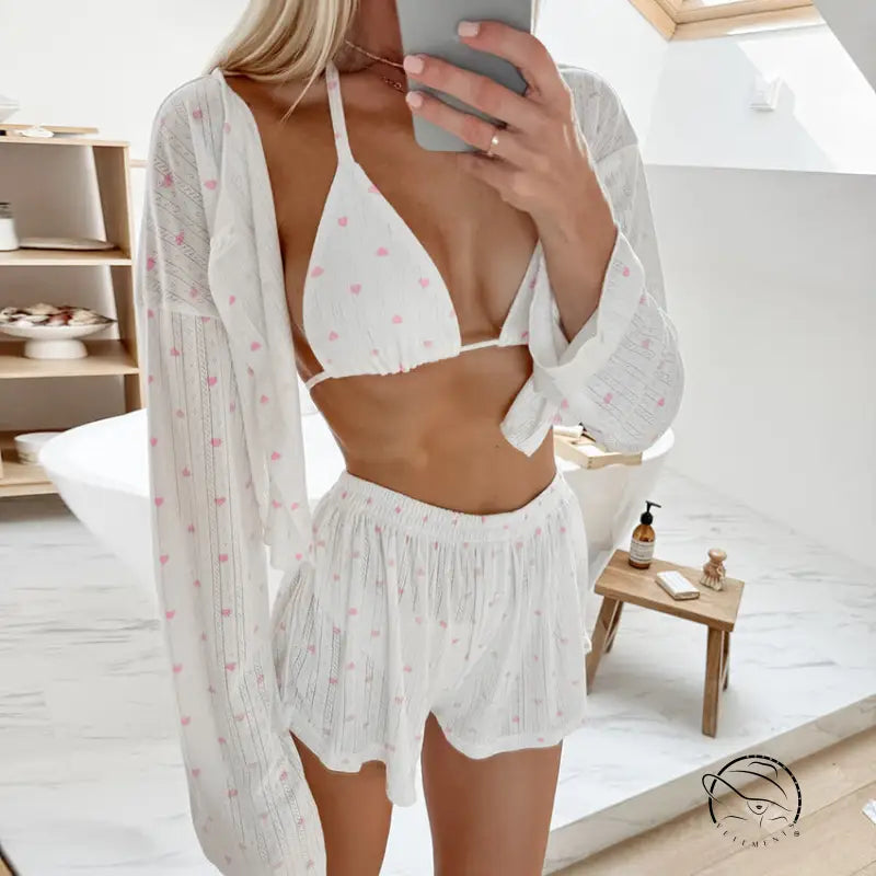White knitted pajamas three piece set with heart-patterned bikini top, shorts, and cover-up