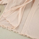 Delicate blush pink sheer Langry fashion nightgown fabric with dotted texture