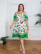 Elegant bohemian dress with bird pattern and straw tote