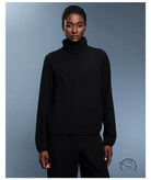 Langry black turtleneck sweater in waterproof thermal fashion coat