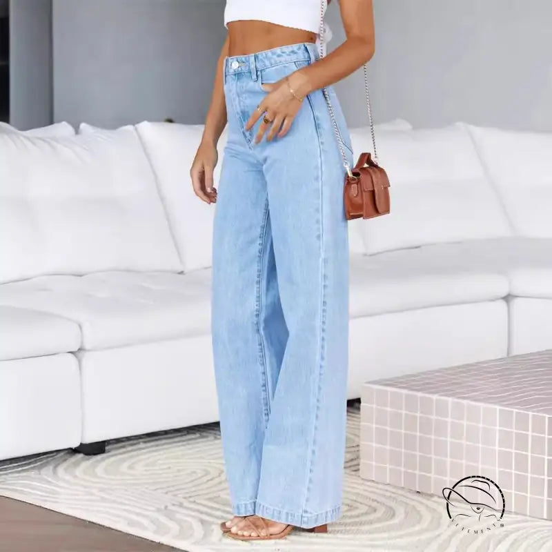Women stretchy wide leg light blue denim trousers on model