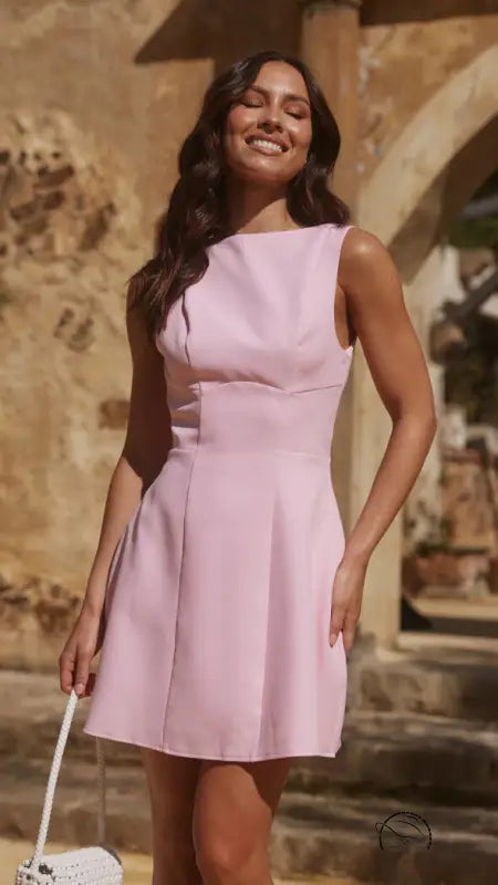 Elegant turtleneck backless dress in light pink sleeveless fit-and-flare style