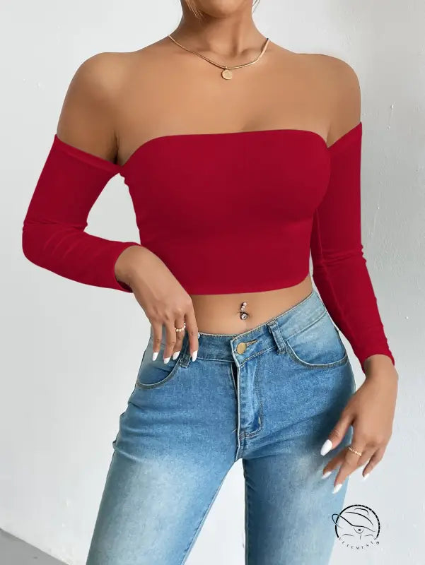 Red camisole waist trimming short sleeve crop top with light wash jeans