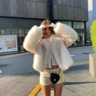Cream fluffy faux fur jacket in Langry fashion, cropped with wide sleeves
