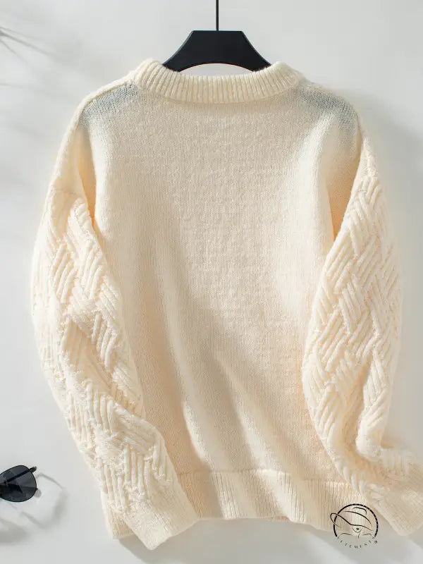 Cream cable knit crew neck sweater with long sleeves, retro winter fashion