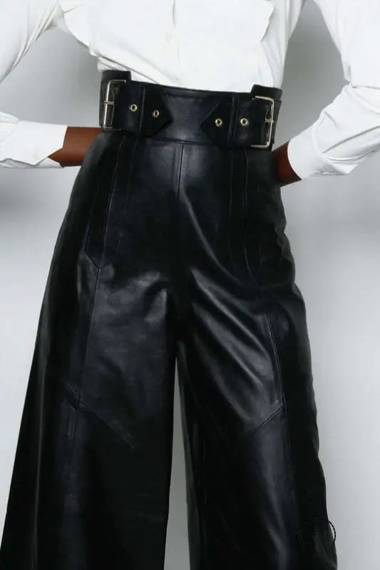 Faux leather bell bottom pants with high waist and double-buckle belt