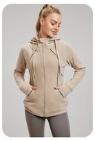 Beige zip-up hoodie with pockets, perfect for thermal workout fashion and ملابس styles