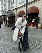 Oversized warm winter faux fur coat with cream design, black trim, pockets, Langry fashion