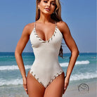 Stunning matching sling white ribbed one-piece swimsuit with trim
