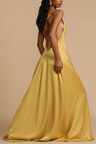 Elegant yellow satin maxi dress showcasing luxurious fashion and langry style