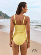 Stunning mesh swimsuit in yellow with adjustable side ties and straps