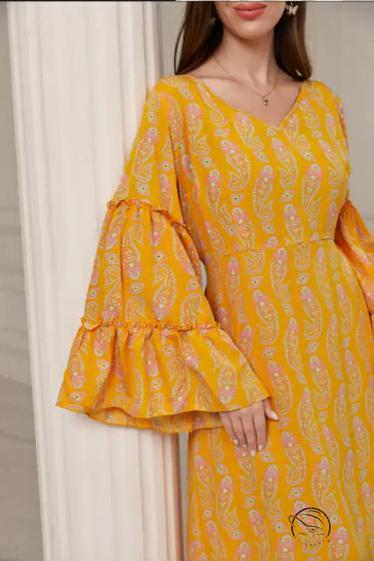 Elegant casual bell sleeve dress in vibrant yellow with pink paisley fashion
